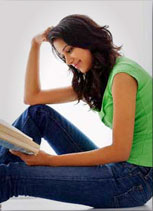 Woman in green shirt reading