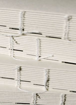 sewn spines stacked
